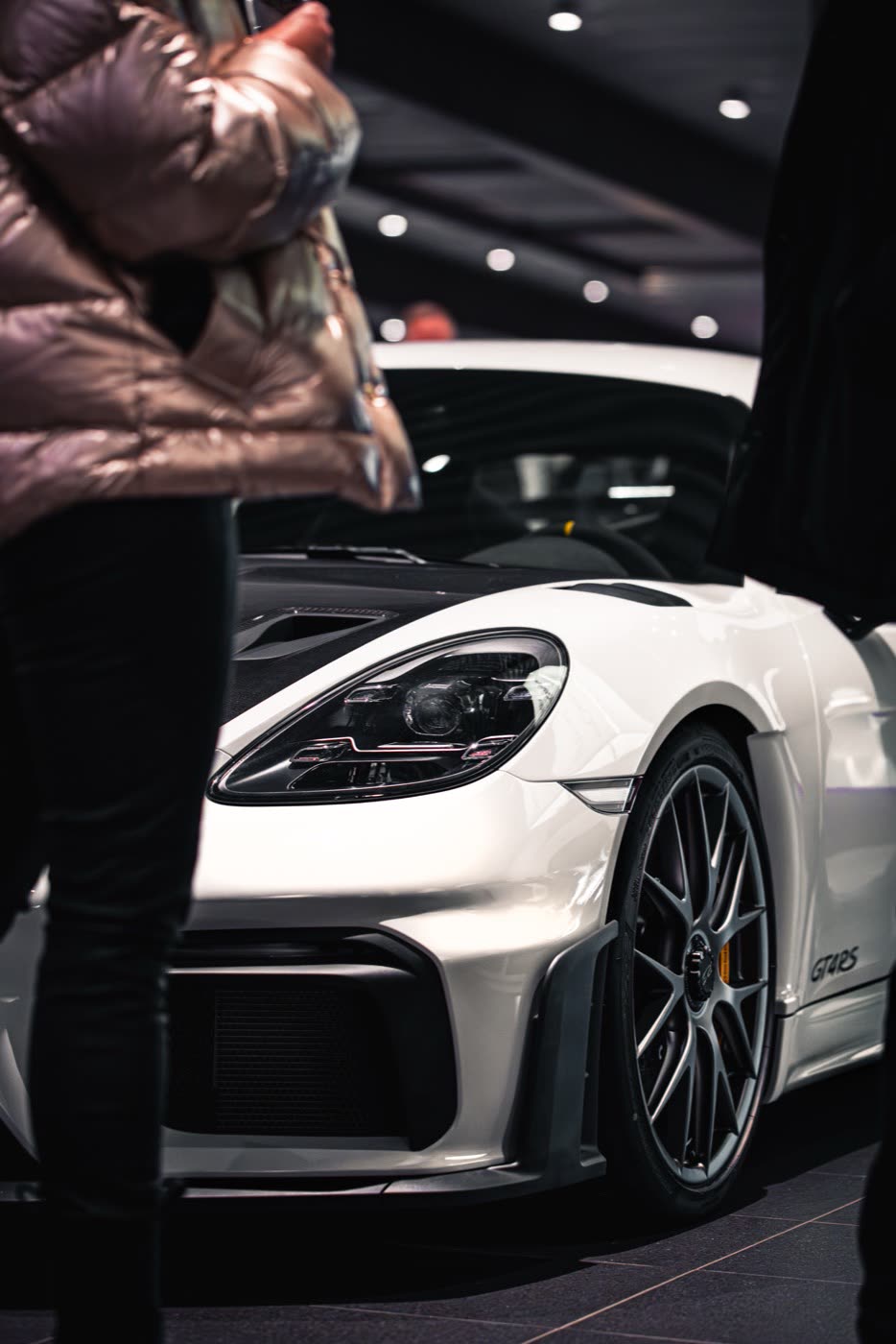 White Porsche 718 Cayman GT4 RS displayed at Porsche Center Kalmar customer event