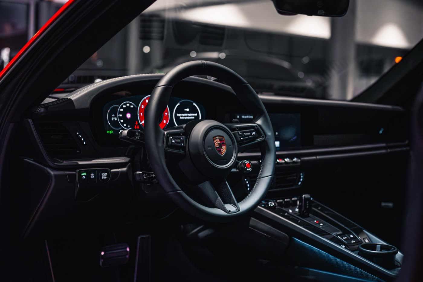 Front view of Porsche 911 Carrera GTS at Porsche Center Kalmar Macan Electric event