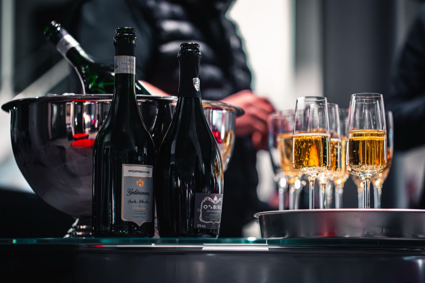 Speaker addressing guests at Porsche Center Kalmar Macan Electric customer event