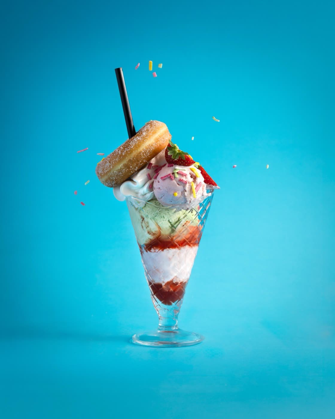 Stack of grilled caprese paninis with mozzarella and basil on a red background, Togo Kalmar