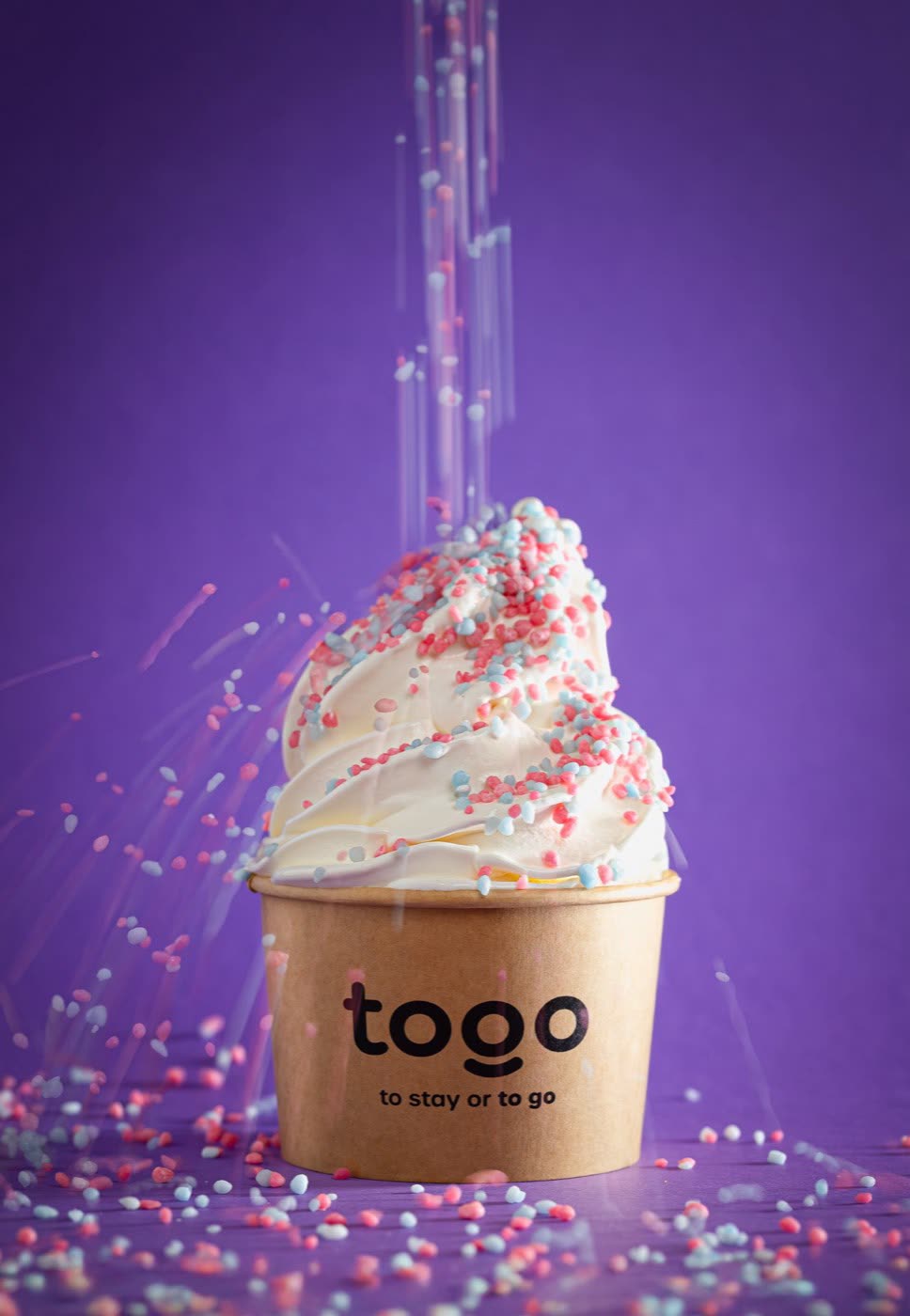 Green kale and citrus juice in a tall glass with paper straw, Togo Kalmar